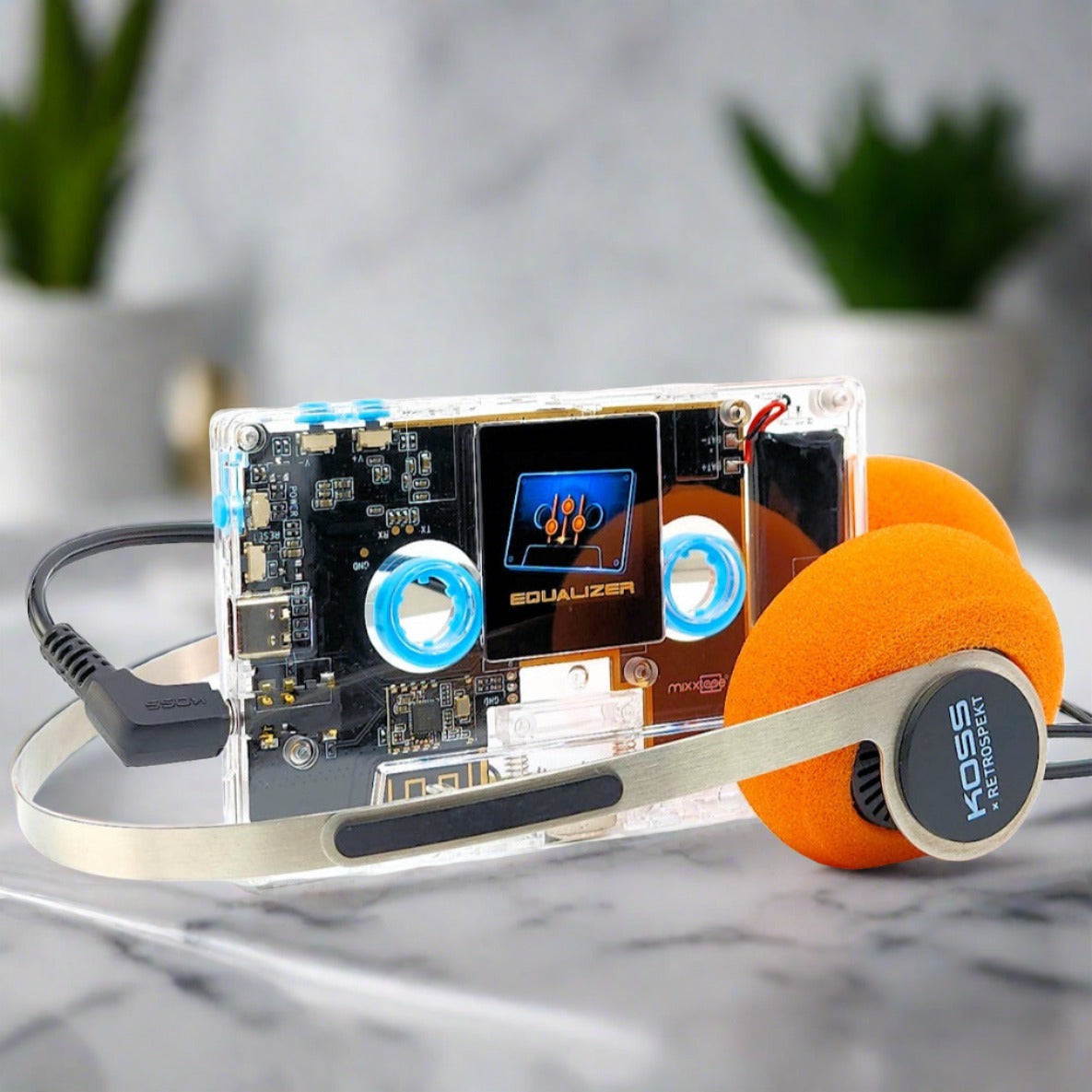 Mixxtape, a groundbreaking fusion of nostalgia and innovation in the world of music. Its retro-inspired design houses a high-resolution touch display, Bluetooth connectivity, and a USB Type-C port for charging and data transfer. The device boasts features such as high-resolution audio playback, a headphone jack, and support for additional memory via microSD card. What sets Mixxtape apart is its ability to play as an actual cassette tape, providing a tangible connection to music and artists.